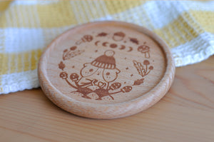 Bubu and Moonch Laser Engraved Wooden Coaster Featuring Crocheting Bubu