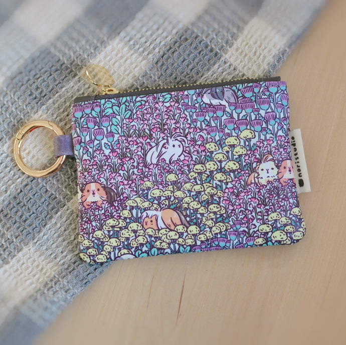 Guinea coin purse by Noristudio