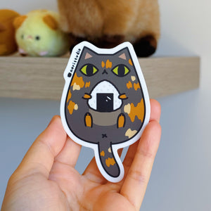 tortie cat with onigiri vinyl sticker by Noristudio