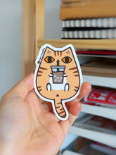 Orange Tabby Cat with Iced Coffee Vinyl Sticker by Noristudio