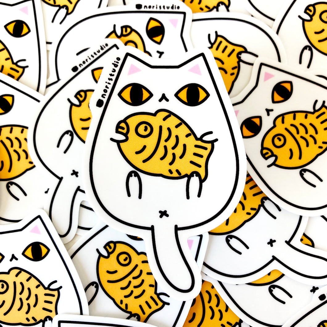 white cat with taiyaki vinyl sticker by Noristudio