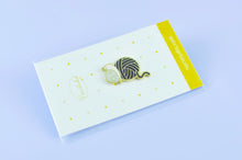 snail enamel pin by Noristudio